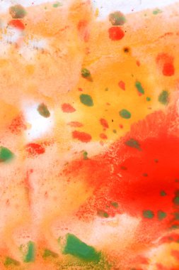 Sıcak soyut arka plan kırmızı, sarı, turuncu mürekkep nokta yeşil damla ile