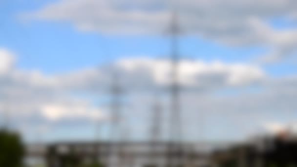 Blurred background. timelapse or fast video power lines and sky with clouds, — Stock Video