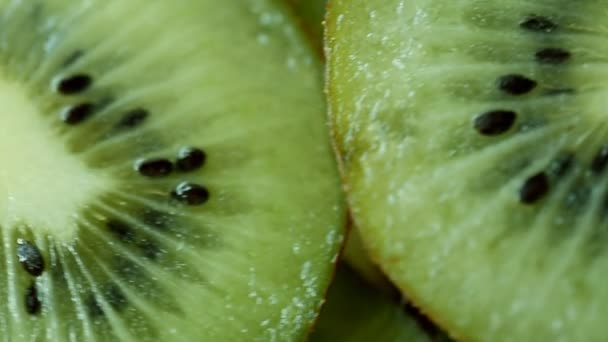 Kiwi skivor bakgrund makro bilder — Stockvideo