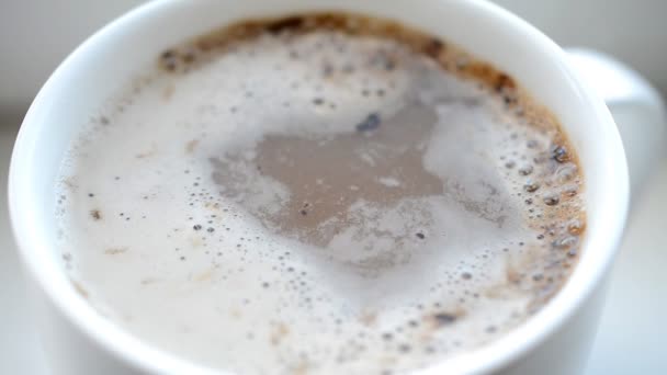 The coffee mug with milk close up — Stock Video