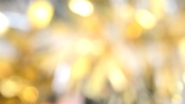 Abstracte bokeh gouden deeltjes — Stockvideo