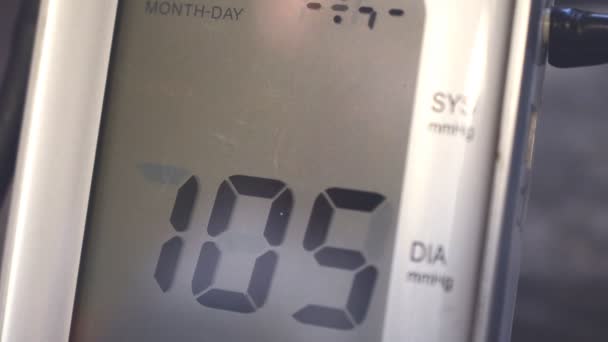 Modern household digital blood pressure monitor — Stock Video