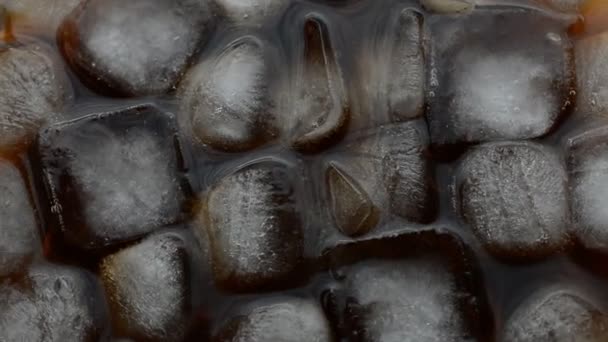 Cola with ice top view — Stock Video