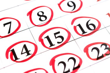 Kırmızı daire ile kalem bir takvim sayfası 14, 15, 16 tarihi işaretli