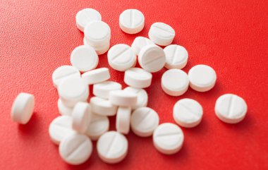 pharmaceutical abstract top view, white pills close-up