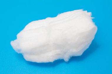 medical cotton isolated on a blue background, medical abstract