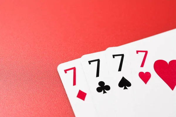 Cuatro siete cartas de juego — Foto de Stock