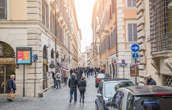 Rome, Italy - February 23, 2019: People walk through the narrow streets of the city of Rome. — Stock Photo, Image