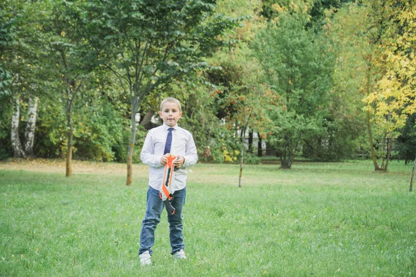 Eight year old child with toy shotgun