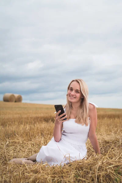 Beautiful Young Woman Mown Wheat Field Phone Her Hands — Stock Photo, Image