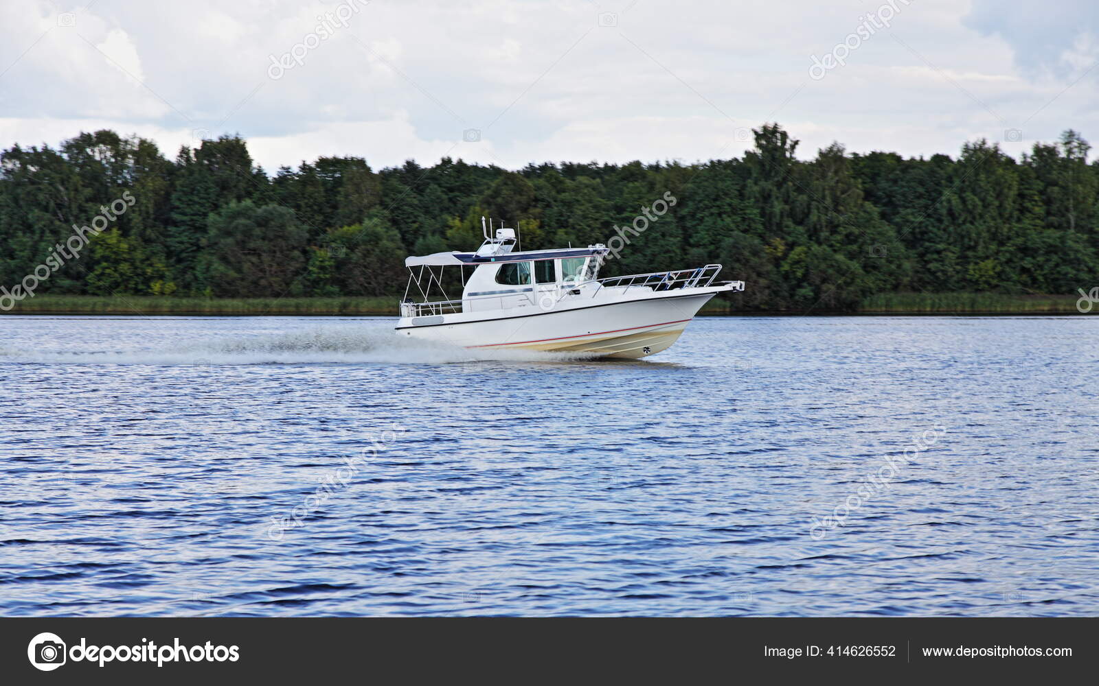 Modern White Cabin Plastic Motor Boat Inboard Motor Fast Floating Stock  Photo by ©ilmarinfoto 414626552