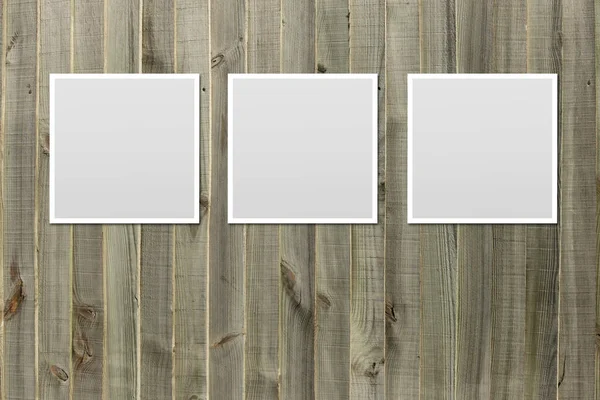 Collage of blank photo frames on old woodedn backgfround. — Stock Photo, Image