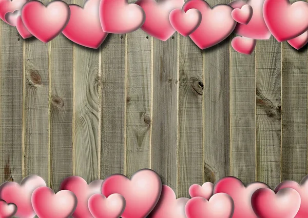 Pink heart-shaped icons on wood background. — Stock Photo, Image