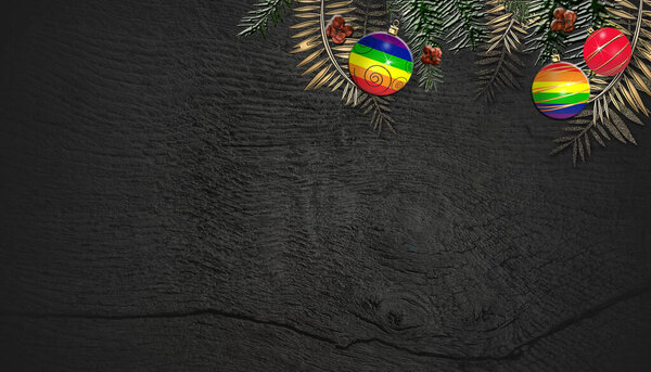 Christmas New Year LGBT flag balls on black wooden background