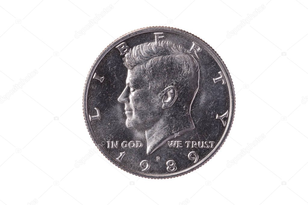 USA half dollar nickel coin (50 cents) dated 1989 with a portrait image of President John Kennedy cut out and isolated on a white background