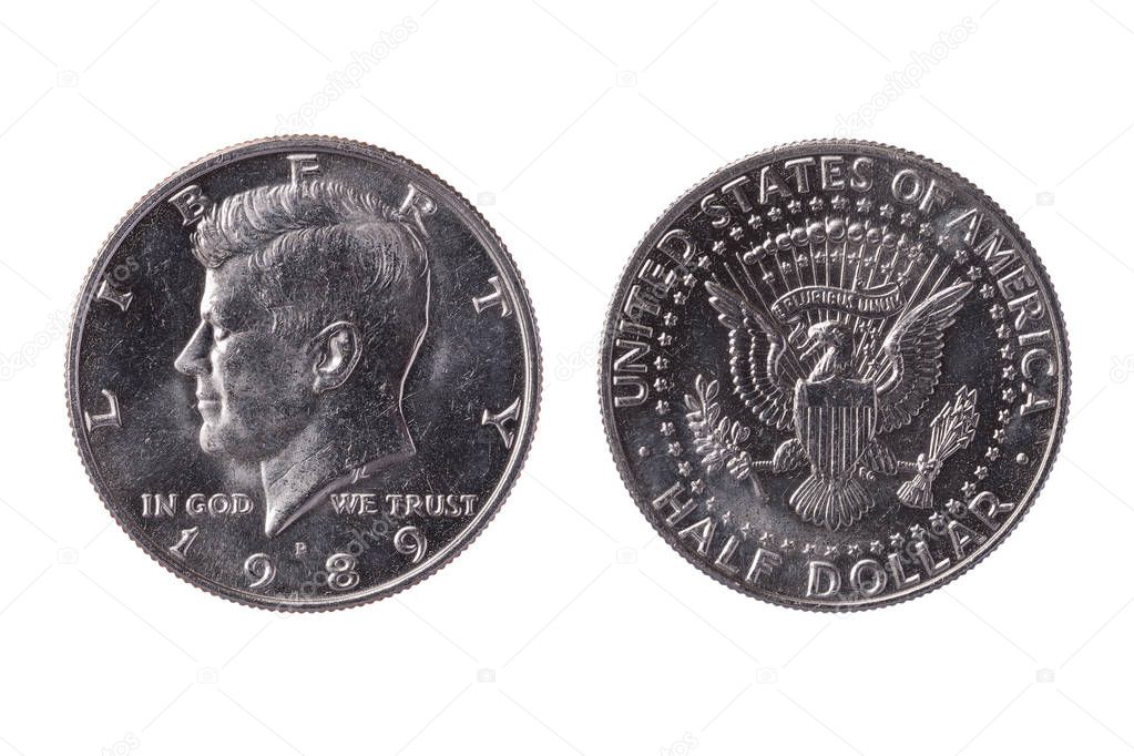 USA half dollar nickel coin (50 cents) dated 1989 with an image of President John Kennedy obverse and a Bald Eagle reverse cut out and isolated on a white background