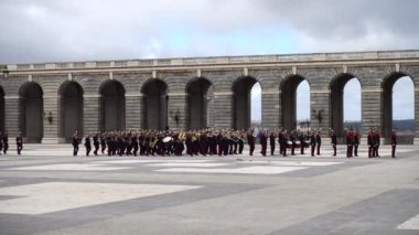 MADRID, SPAIN - APRIL 04, 2018: The ceremony of the Solemn Changing of the Guard at the Royal Palace of Madrid. That is famous event performed on the first Wednesday of each month. 