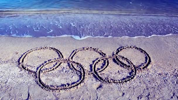 Cinq Anneaux Sur Sable Plage — Video