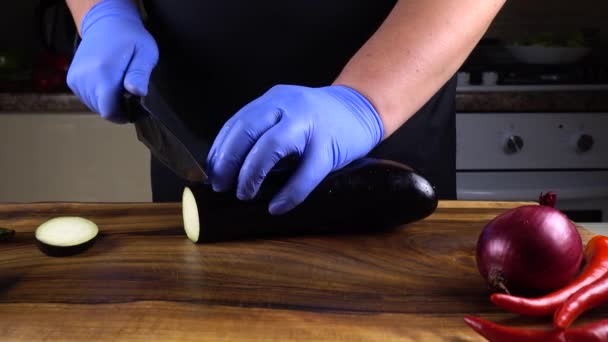 Cook Cuts Eggplant Board — Stock Video