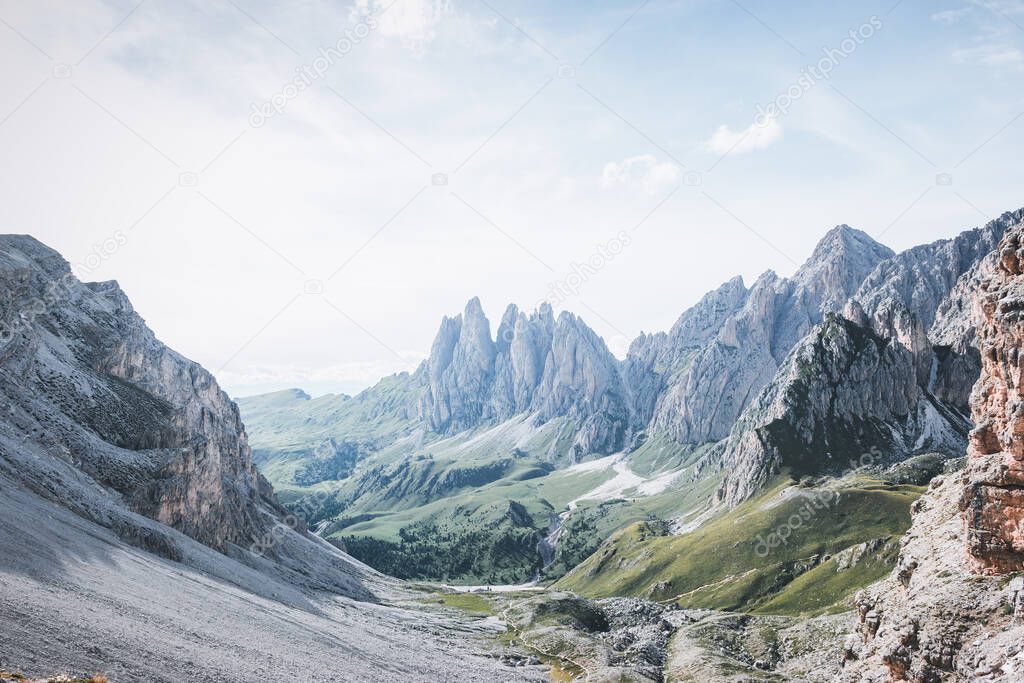 green lands between the Italian mountain ranges. 