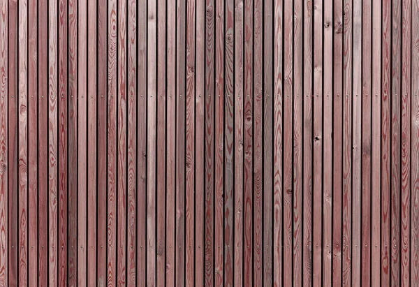 Tábuas de madeira vermelho fundo — Fotografia de Stock