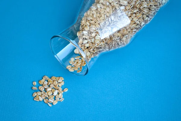 Tarro Vidrio Con Harina Avena Sobre Fondo Azul Harina Avena — Foto de Stock