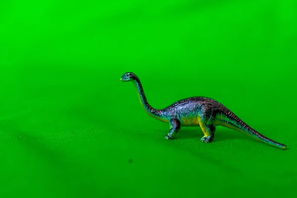 Jouets Pour Enfants Sur Fond Vert Dinosaures — Photo