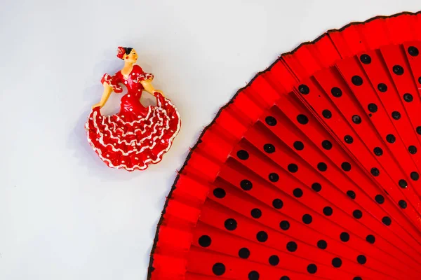 miniature figure of a dancer in combination with women\'s things-fan, lipstick, perfume, beads