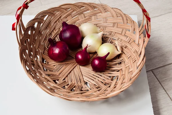 red onion and white onion wicker basket