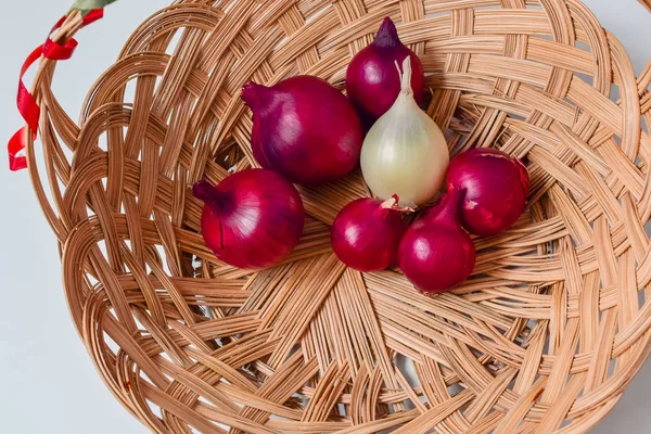 red onion and white onion wicker basket