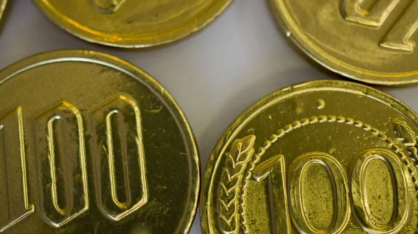 fake money - chocolate in the form of coins covered with Golden foil