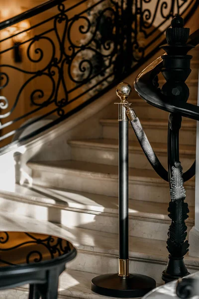 Elegant entrance to the second floor. beautiful staircase