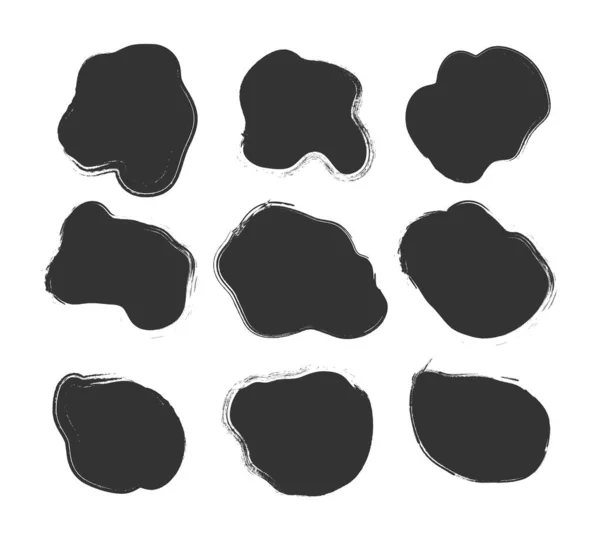 Brushes ink splatters. — Stock Vector