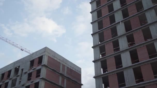 The construction of a new modern residential complex. dolly camera shot — Stock Video