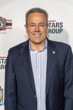 LAPD Şefi Michel Moore 10 Kasım 2018 'de Los Angeles, Kaliforniya' da düzenlenen AVALON Hollywood 'da Kahramanlar için LAPMF Kahramanlar Poker Turnuvası ve Kumarhane Gecesi Partisi' ne katıldı.