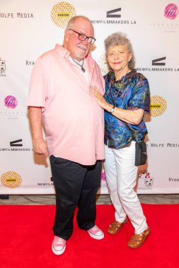 Ron Iseli, Eve Sigall 13 Temmuz 2019 'da RealD, Beverly Hills, CA' da Los Angeles Premiere 'e katıldı.