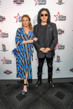 Shannon Tweed, Gene Simmons, 10 Kasım 2018 'de Los Angeles, Kaliforniya' da düzenlenen AVALON Hollywood 'da Kahramanlar için LAPMF Kahramanlar Poker Turnuvası ve Kumarhane Gecesi Partisi' ne katıldı.