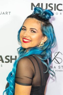 Katrina Stuart 28 Eylül 2019 tarihinde Hollywood 'daki Liaison restoranında Musicash Records Katrina Stuarts Single Record Blue Roses Çıkış Partisi' ne katıldı. 