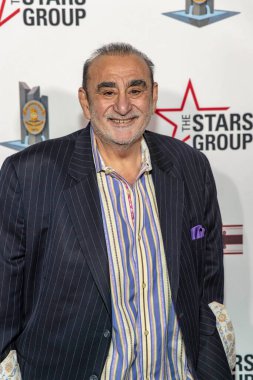 Ken Davitian attends 2018 LAPMF Heroes for Heroes Celebrity Poker Tournament & Casino Night Party at AVALON Hollywood, Los Angeles, California on November 10th, 2018 clipart