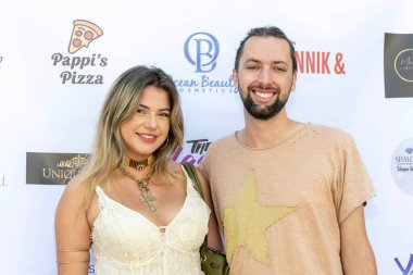 Grace Anne ve erkek arkadaşı Melrose, Los Angeles 'taki Lash Plug' da Hazel-E 'nin ev sahipliğini yaptığı Lüks Açılır Hediye Süitine katılıyor. 10 Eylül 2025