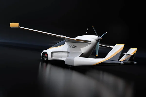 Rear view of futuristic autonomous car on black background. Flying car concept. 3D rendering image.