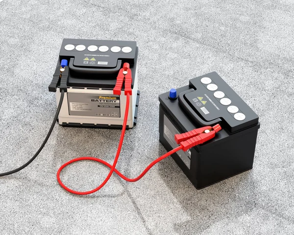 Generieke Onderhoudsvrije Auto Batterijen Verbonden Door Jumper Kabel Concrete Ter — Stockfoto