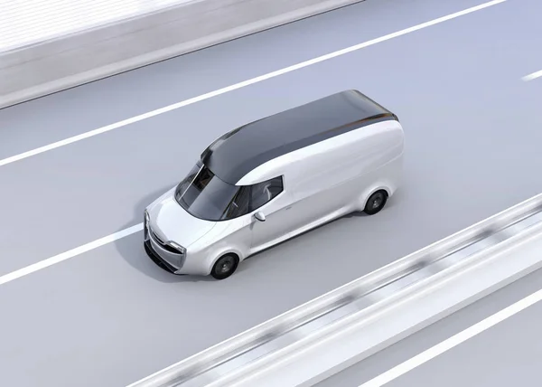 Self-driving delivery van driving on highway. Copy space on side body. 3D rendering image.