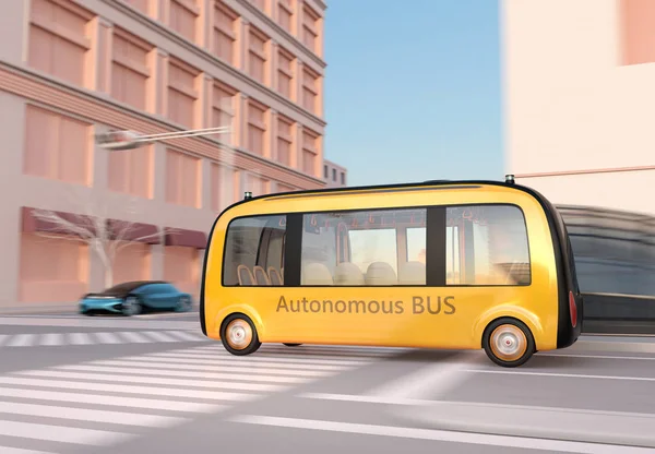 Yellow self-driving shuttle bus is driving through an intersection. 3D rendering image.
