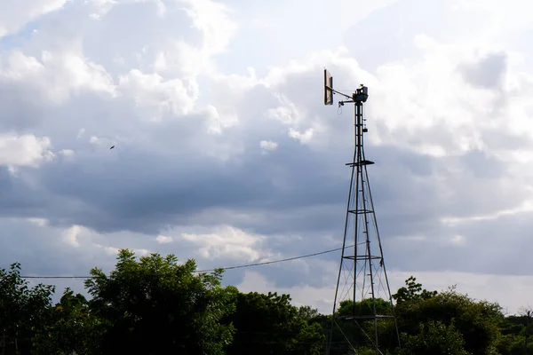 a view of weather vane tower isolated in nature