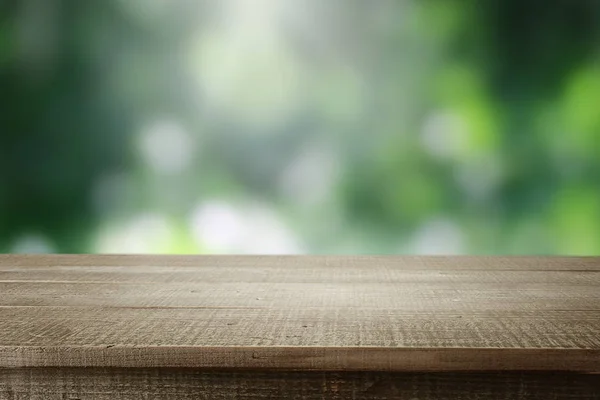Wooden Desk Blur Green Background — 스톡 사진
