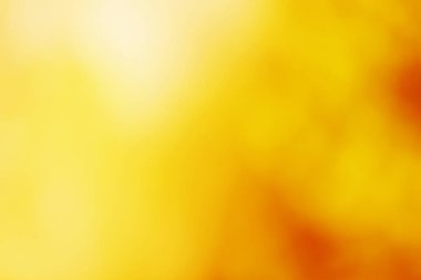 Soyut bulanık turuncu ve sarı renk arka plan.