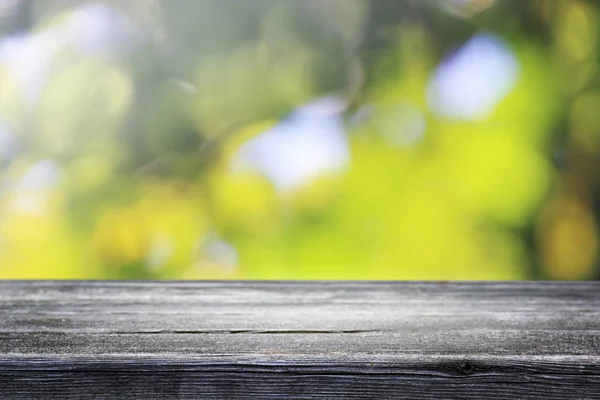 Blurred Astratto Verde Bokeh Tavolo Legno Sfondo — Foto Stock