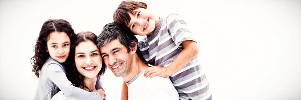 Padres Sonrientes Dando Sus Hijos Paseo Cuestas Sobre Fondo Blanco —  Fotos de Stock