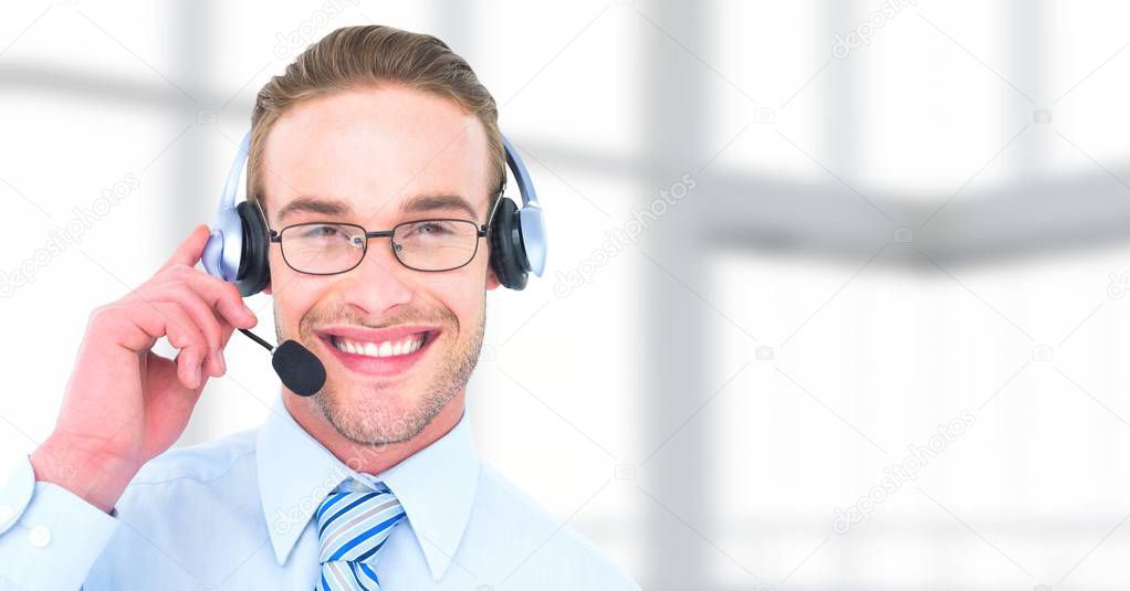 Digital composite of Customer service man with bright background in call center